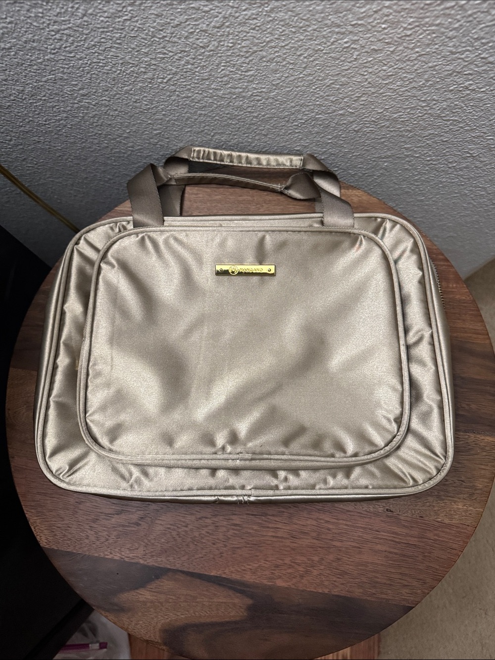 Joy Mangano light and chic travel toiletry case